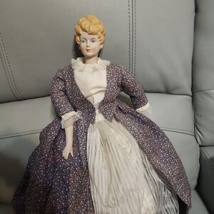 Vintage Porcelain Doll in Floral Dress